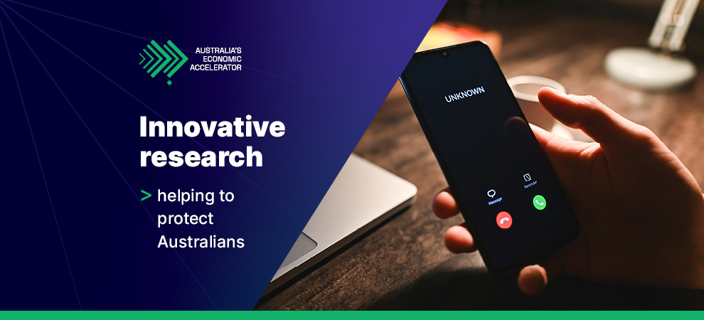 Image of a hand holding a phone with the caller being unknown. Innovative research Newsroom Banner