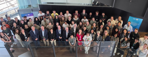 EMBL group image of people in an office.
