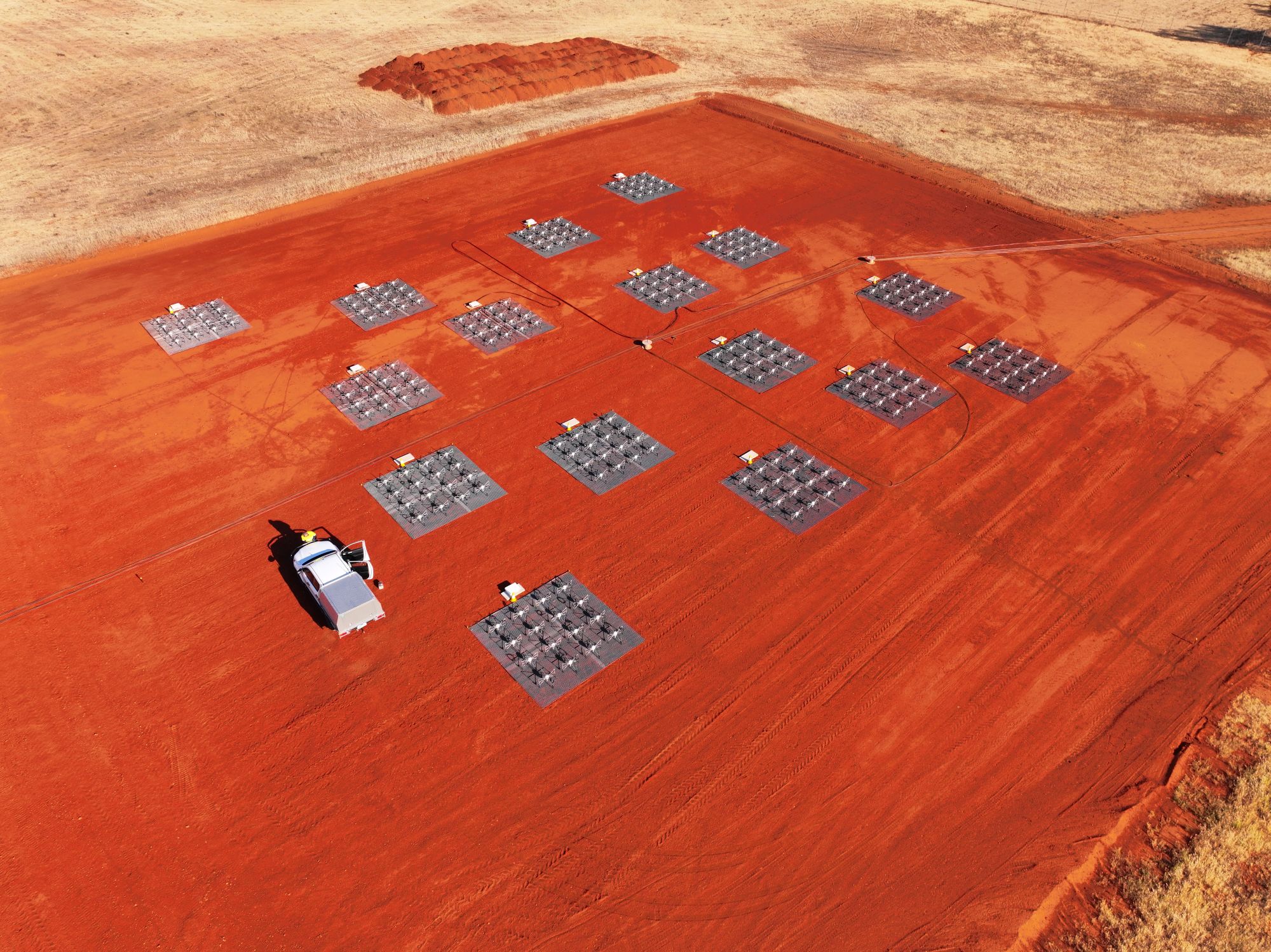 Multiple InteRFeX antennas on red soil.