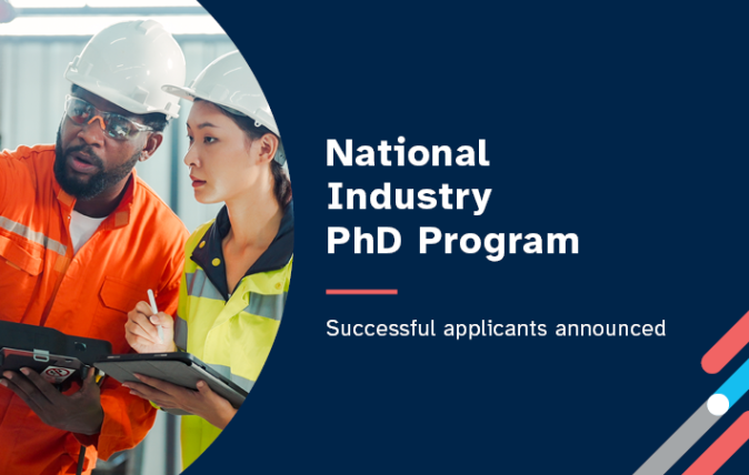 A man and a woman, at an industrial site, wearing hard hats and high vis, short sleeve shirts. Includes the words: ‘National Industry PhD Program – Successful applicants announced.’