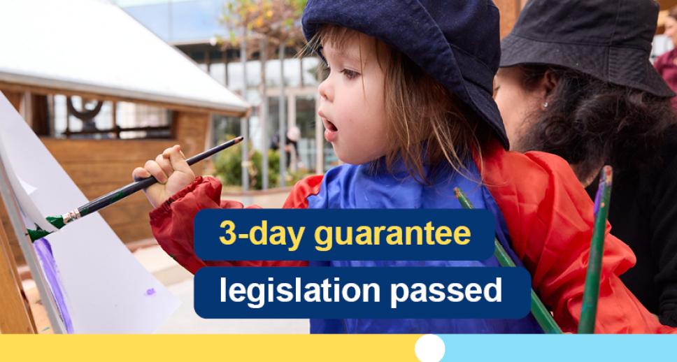 Image of a child wearing a hat and painting a picture. 3 day guarantee legislation passed.